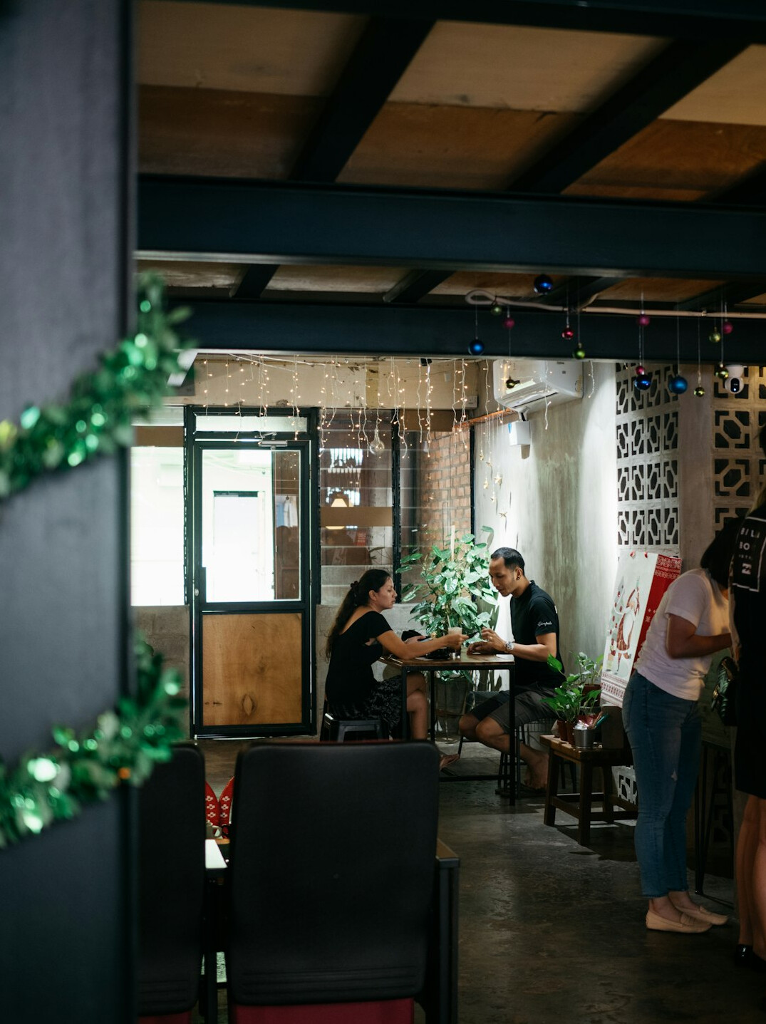 group of people discussing in cafe
